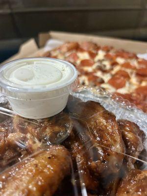 BBQ Chicken Dinner with a Large Pepperoni and Sausage Pizza   BBQ Wings are a 10/10 recommend!