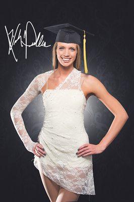 Senior portrait with a graduation cap and dance outfit.