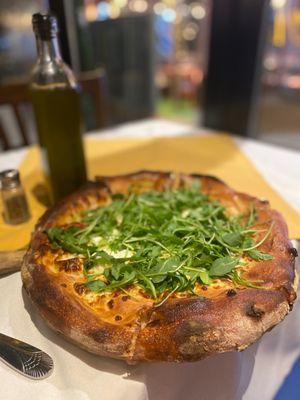 Formaggi brick oven pizza with added fresh arugula