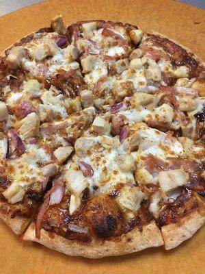 BBQ Chicken Pizza: BBQ Sauce, Mozzarella Cheese, Red Onions, Bacon, Diced Chicken