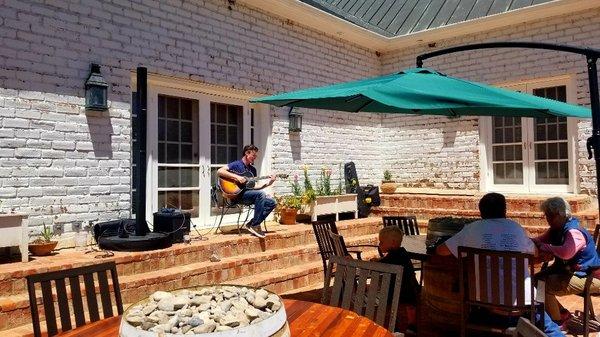 Beautiful day on the patio with live music by Malachi Martin