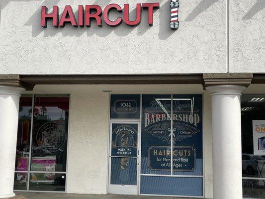 Mission Square Barbershop front display.