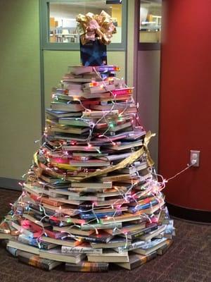 A holiday tree made from books.