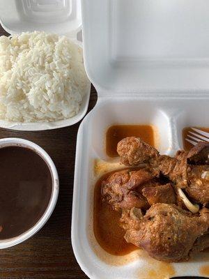 Rice, black bean sauce and stew chicken.