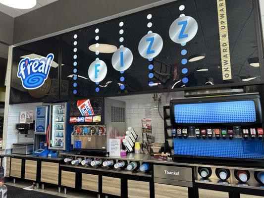 Frozen yogurts, icees and fountain soda station