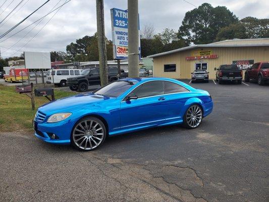 Mercedes SL550 full vehicle chrome blue wrap. 
3m window tinting to the sides, back & front windshield.