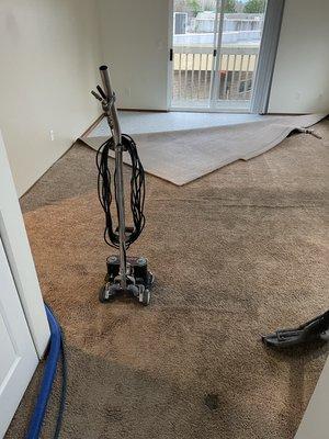 Carpet stretching and restorative cleaning