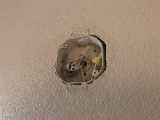 Smoke alarm ripped out of the wall.