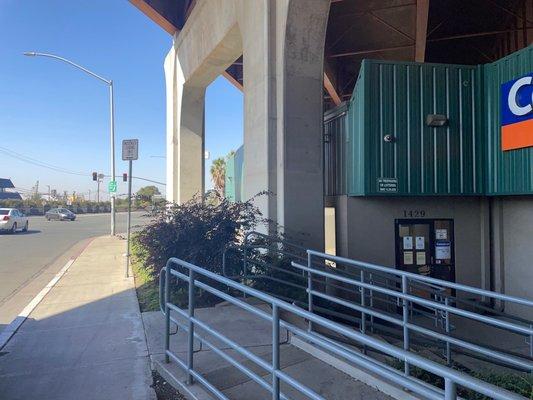 The Entrance to the location that is directly under the freeway