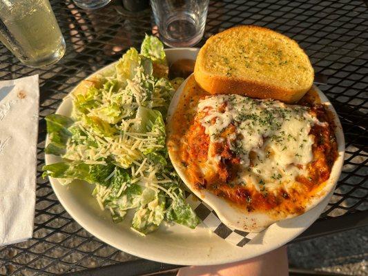 Classic Lasagna, caesar salad, garlic bread