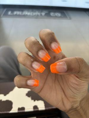 orange french tip gel manicure