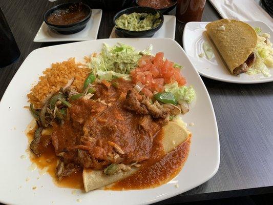 Enchiladas Rancheras and hard shell pork taco.