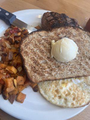 Steak and eggs with sweet potato hash