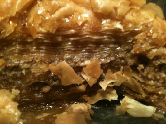 Factory made baklava. 60 layers of dry phyllo on a slab of honey and crust.