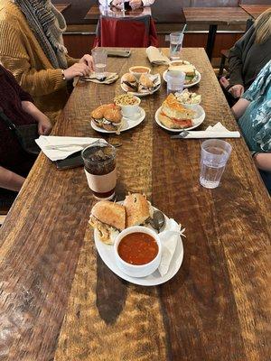 Yummy soup, sandwiches and side salads