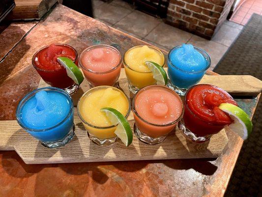 Like a rainbow of margaritas! Our Frozen Flight of margaritas lets you choose four of your favorite flavors of our frozen margaritas.