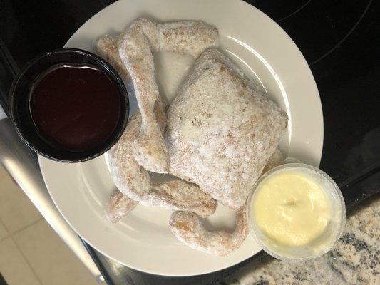 Beignet and Beignet fries with raspberry and lemon cream dipping sauces.