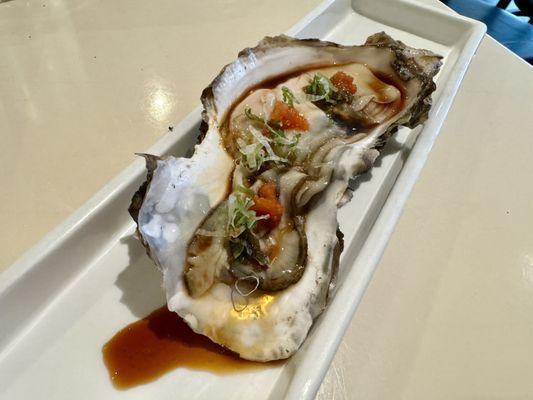 Raw Japanese oyster with Ponzu, scallion and green onion