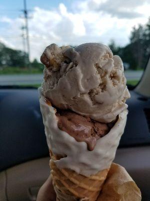 Dipped white chocolate waffle cone with German chocolate cake and pecan something, for the road.