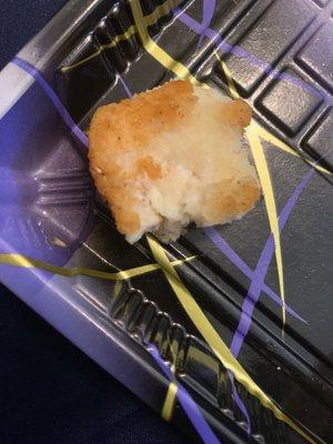 Half way cooked chicken nugget. This wasn't the only one in my cup of nuggets