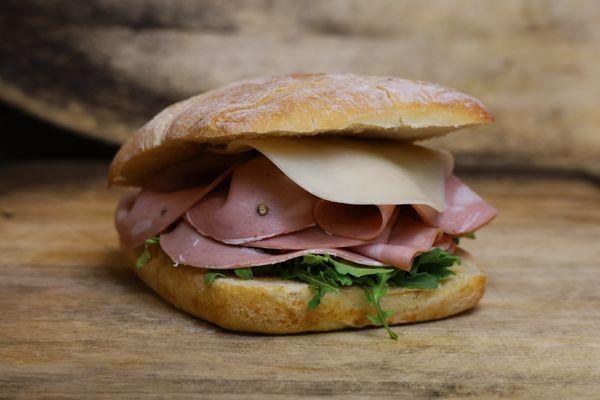 Mortadella - moetadella, arugula, tomato, prvolone, pistachio cream.