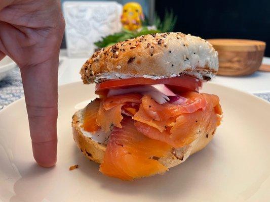 Smoked Salmon Bagel. Finger for scale. It's a big boy!