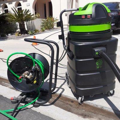 commercial vacuum for catching water runoff, trying to be as compliant as possible with City regulations