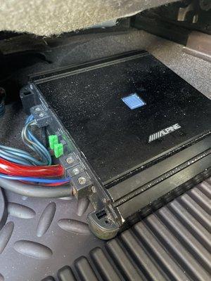 Amp laying in the back floor board