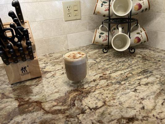 A homemade latte on our granite kitchen tops