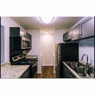 One of our fully renovated kitchens with our slate cabinets