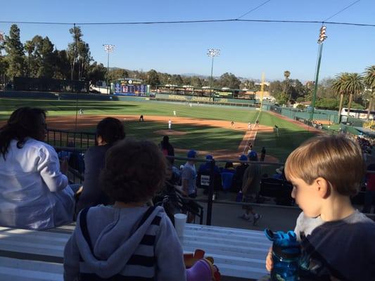 Two kids catching a ball game