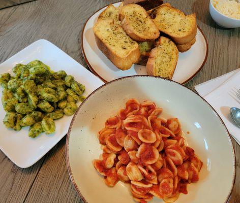 Pasta with Pesto on the left and marinara on the right - Both were Pastosa sauces and the bread was toasted with garlic & herbs - The bread