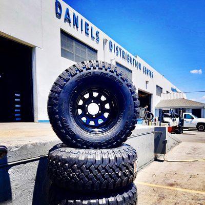 Mounted new tires on these black steel wheels for a Rockcrawler.