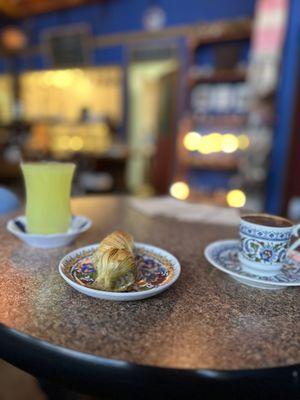 Fruit tea, mussel baklava, cardamom coffee.