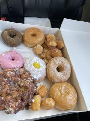 Apple fritter, doughnut holes, lemon and raspberry cream filled, eat the candied coconut and red velvet doughnuts. Very delicious!