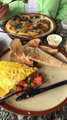 Salsa omelet with 12 grain toast, blueberry pancake. YUM!