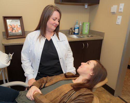 Houston Uptown Dentist treating dental patient.