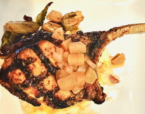 Pork chop with mashed potatoes, brussel sprouts, and cinnamon apples