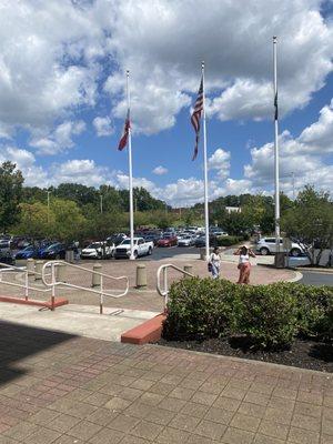 Flags & monument in front of building