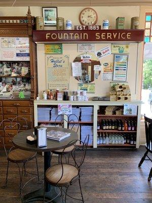 Menu on the wall & their own Books 4 Sale about the history of Hallet's Store over 100 years old since 1889 Rt 6A Cape Cod Yarmouthport MA