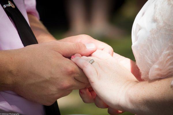 Hand holding after the wedding