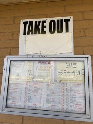 Front, next to door, w sign saying "take out" is available. Guess not.