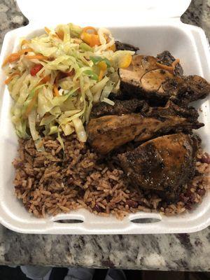 Jerk chicken, rice n peas, and stir-fried vegetables.