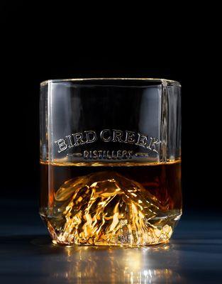 Custom whiskey glass with our signature mt adams formed in the glass