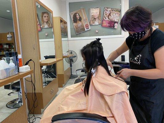 Nancy cutting my daughter's hair