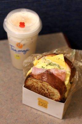 B4 Soy Custard Milk Tea W. Soy Mousse 豆乳奶盖茶 ($6) and E1 Ham & Egg & Cheese Sandwich 火腿厚蛋烧芝士三明治 ($8)