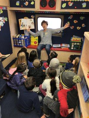 The library bus came to visit the school and read many books to the class. The kids loved it and got to take home their very own book.