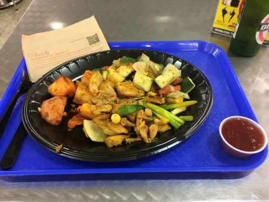 Curry Chicken and stir fried potatoes and sweet veggies.