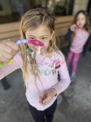 Making bubbles and bubble wads for breathing at Artsy Yoga Camp!