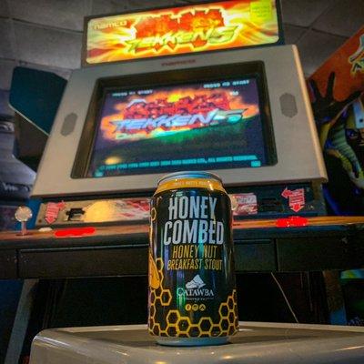 Enjoy a craft brew or other adult beverage while you play arcade games at Stop_Button